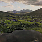 Garth Farm Campsite, Capel Curig - aerial view with Snowdon Garth Farm Campsite, Capel Curig - aerial view with Snowdon
